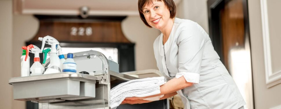 Hotel staff using commercial laundry services